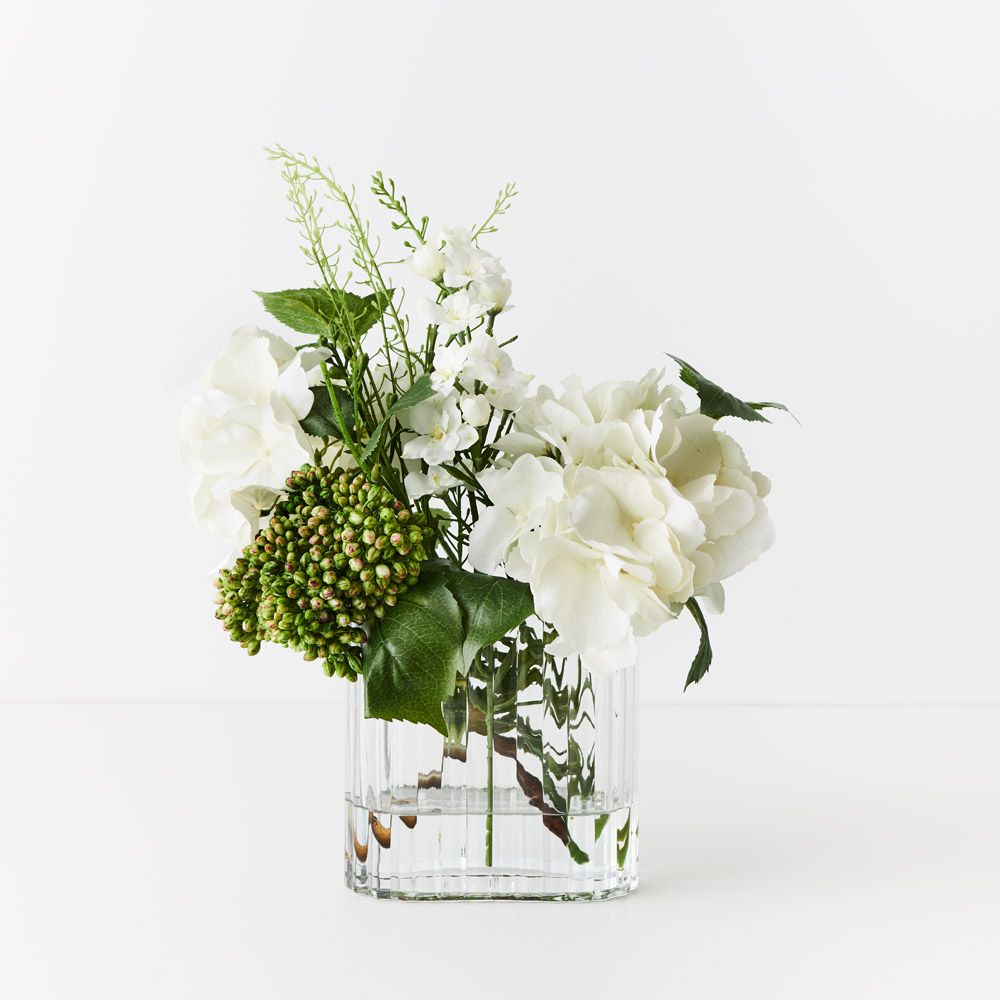 Artificial white hydrangea and larkspur in ripple glass vase 43cm