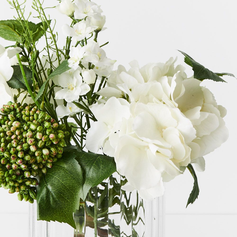 Artificial white hydrangea and larkspur in ripple glass vase 43cm – view 2