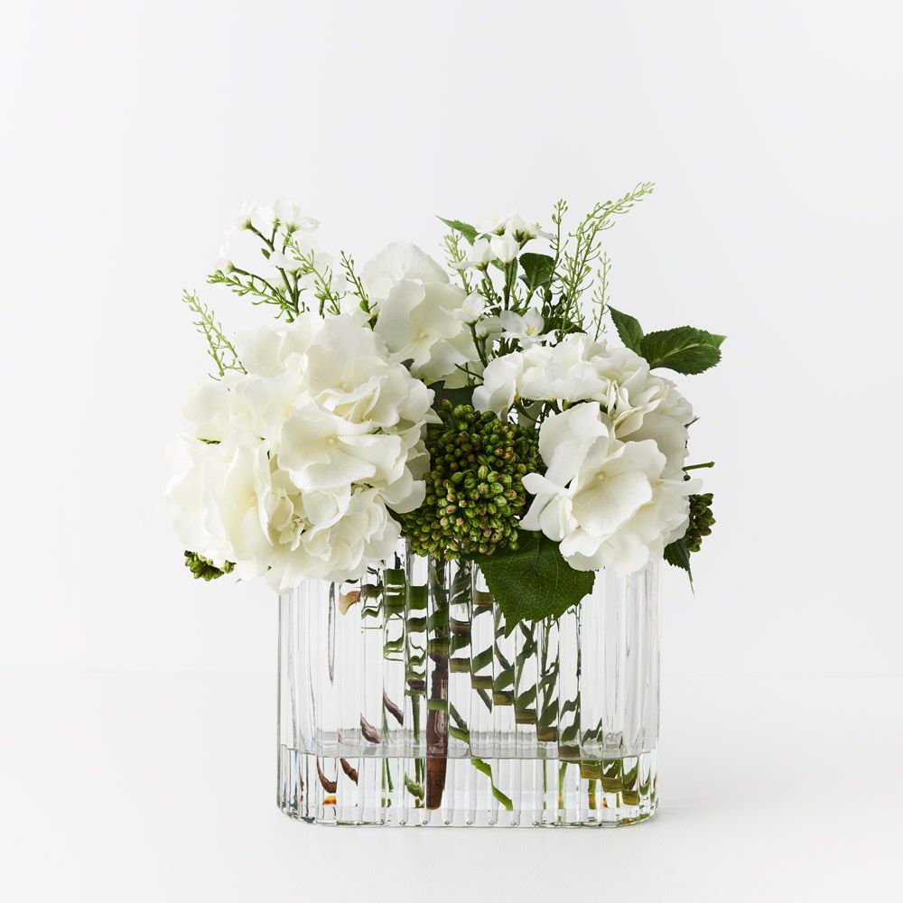Artificial white hydrangea and larkspur in ripple glass vase 46cm