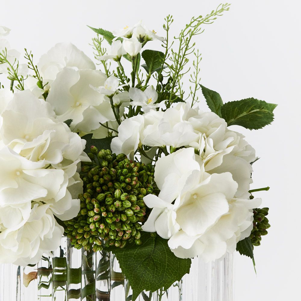 Artificial white hydrangea and larkspur in ripple glass vase 46cm – view 2