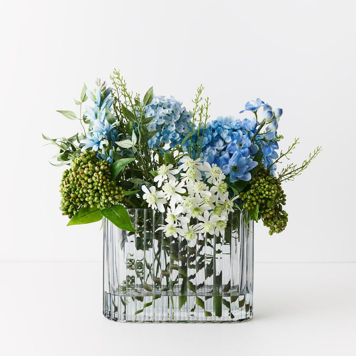 Wide artificial blue and white hydrangea and delphinium in ripple glass vase 45cm