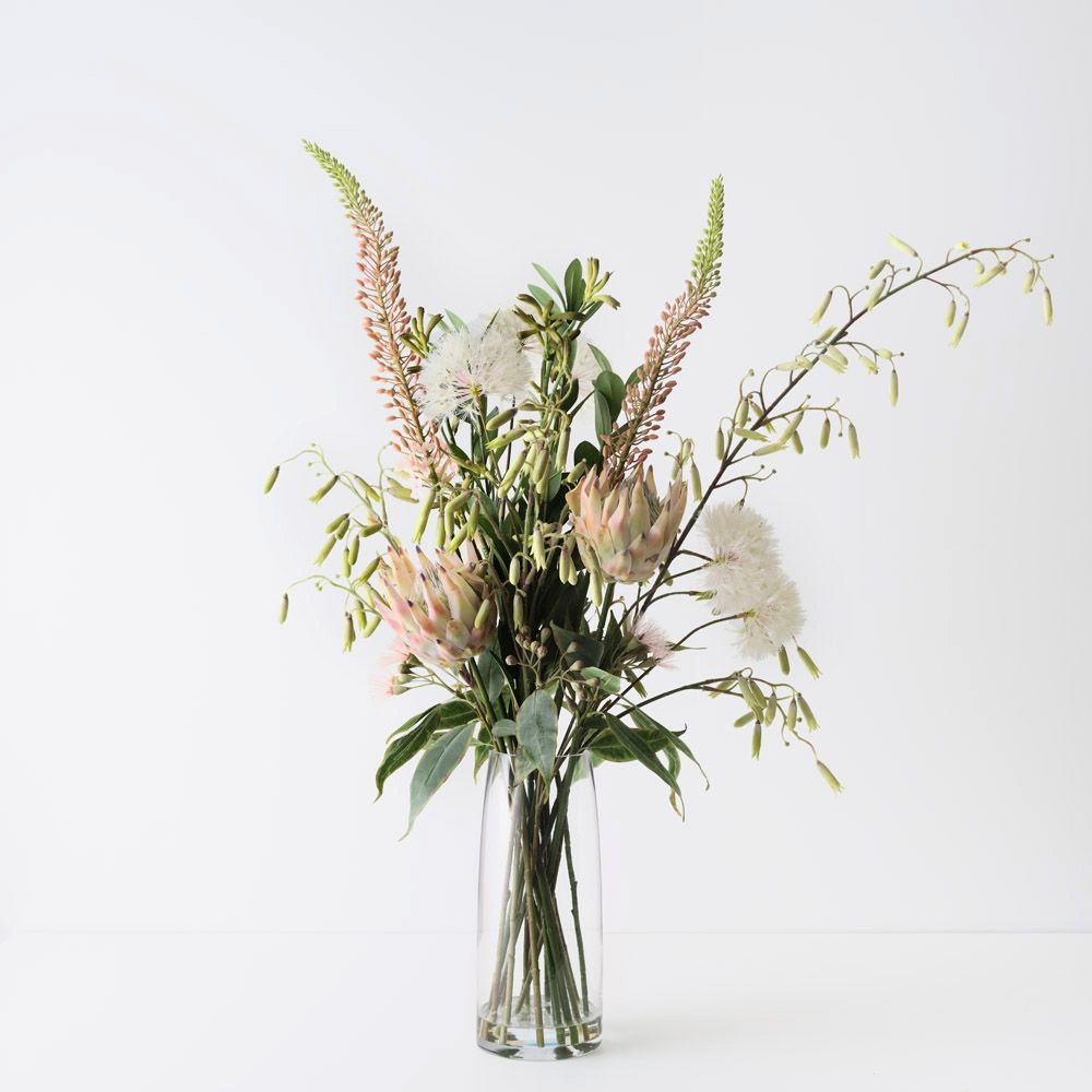 Artificial dandelion and protea arrangement in glass vase 110cm