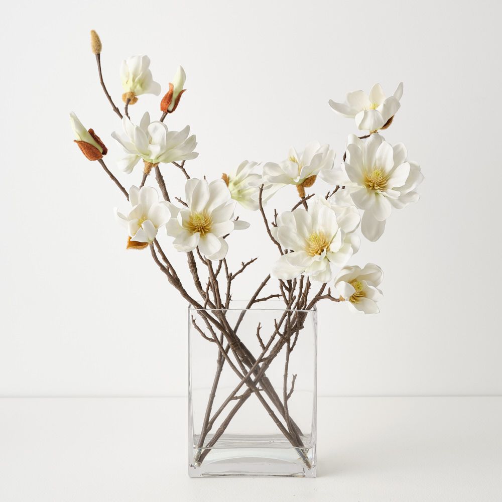 Artificial white magnolia arrangement in glass vase 42cm
