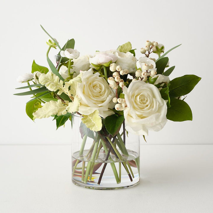 Artificial white ranunculus and rose arrangement in glass vase 33cm