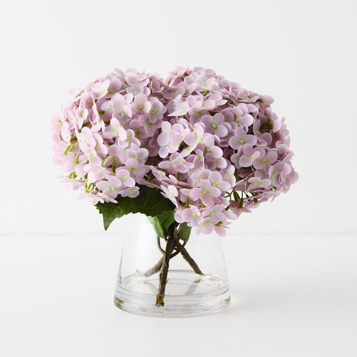Artificial dusty pink hydrangeas in glass vase 26cm