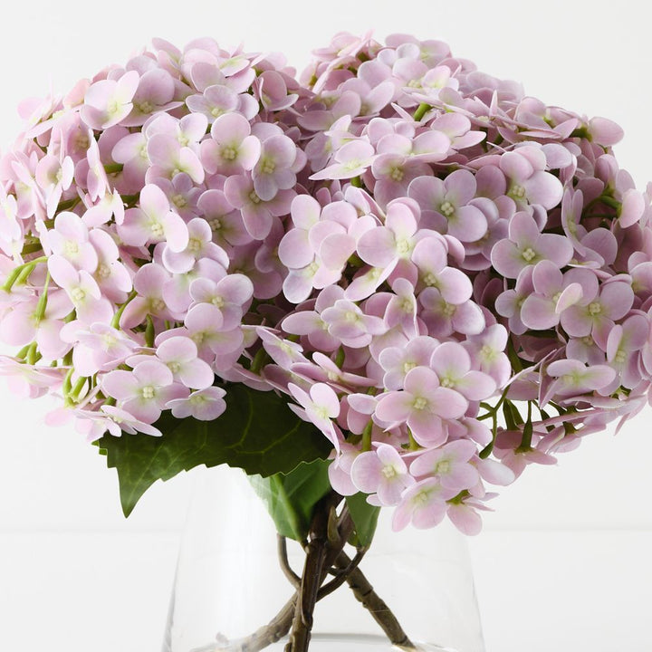 Artificial dusty pink hydrangeas in glass vase 26cm – view 2