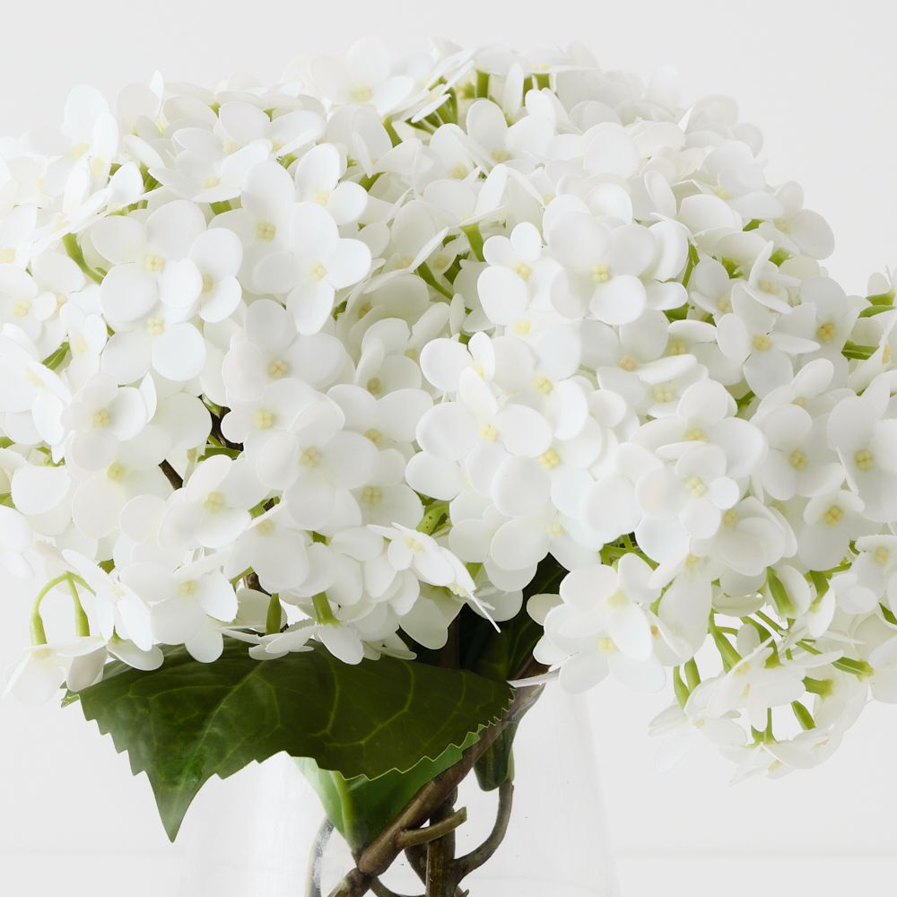 Artificial white hydrangeas in glass vase 26cm – view 2