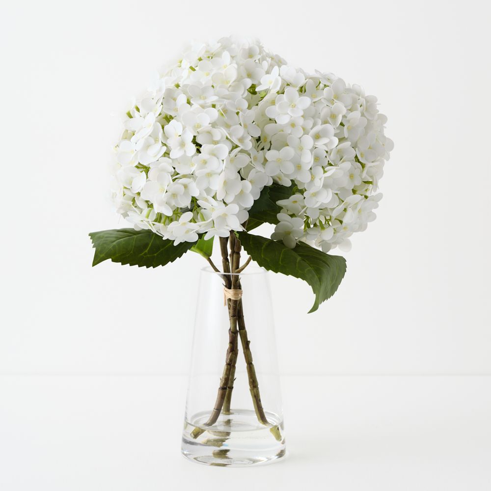 Artificial white hydrangeas in glass vase 38cm