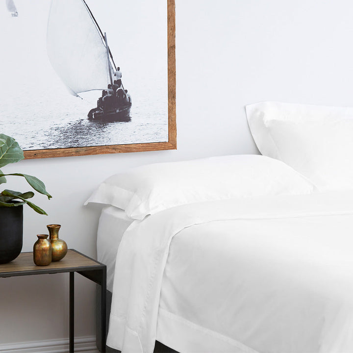 Resort white sheet set with European turnback border