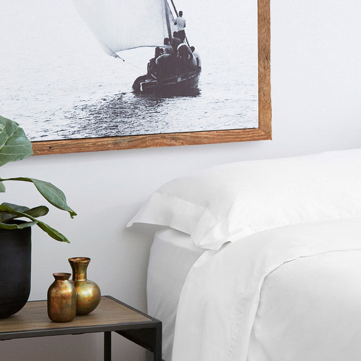 Pair of white cotton sateen King pillowcases
